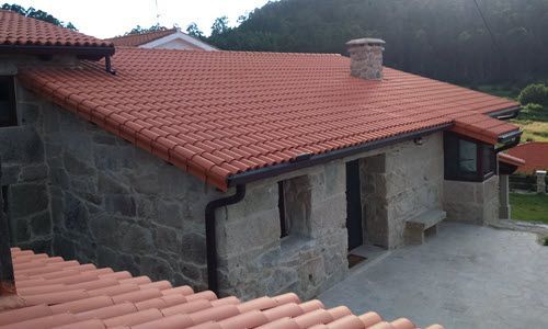 Fotografía de vivienda rehabilitada de granito antiguo en Soutomaior
